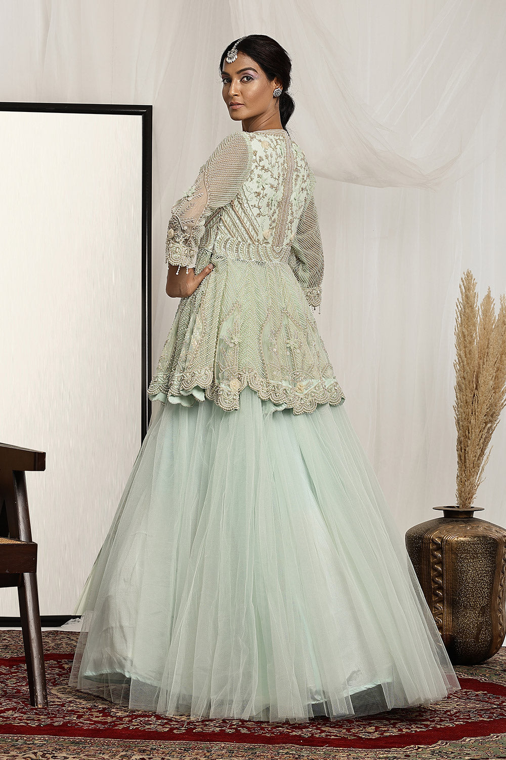 Embellished Peplum Top with a Ball Gown Skirt